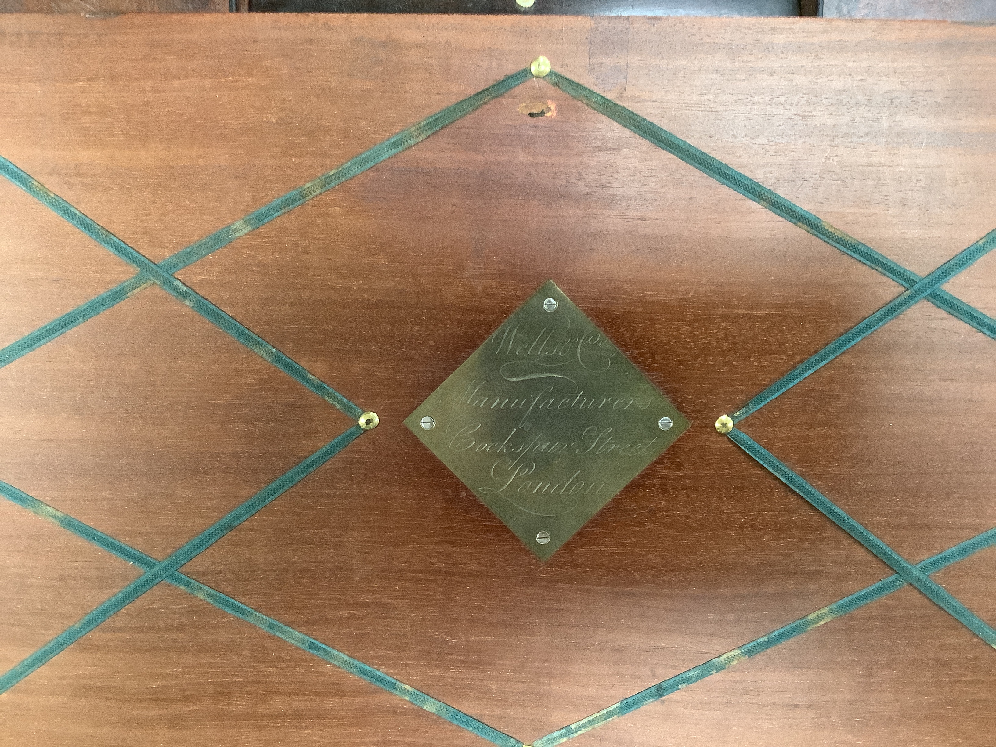 A George III mahogany, ebony and brass-mounted ship's writing box by Wells & Co., screw fixings to each side with original key, 50.5cm x 30cm x 19.5cm